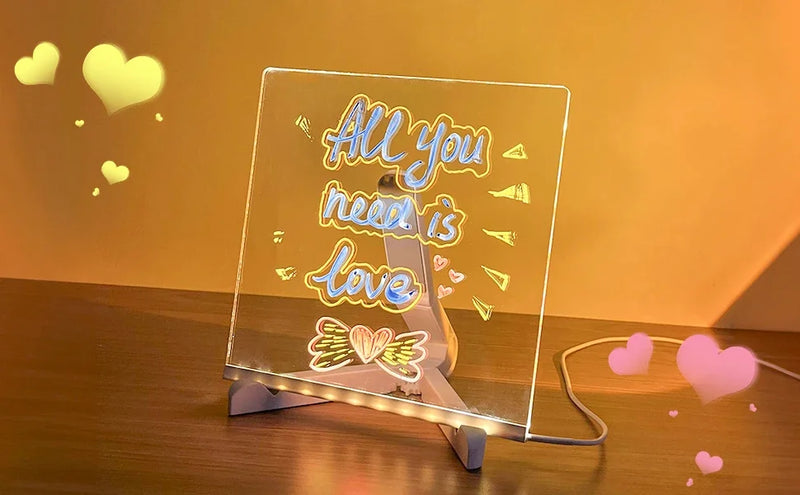 Quadro Mágico de Desenho com Luz LED — Acrílico Transparente, Apagável e com 7 Canetas Coloridas!